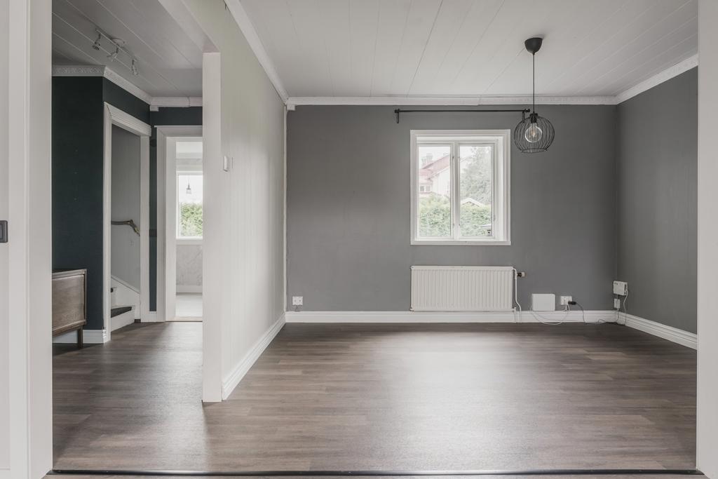 Flexibelt allrum med plats för soffa och tv, eller varför inte inreda som matsal och skapa en generös matplats i direkt anslutning till köket?