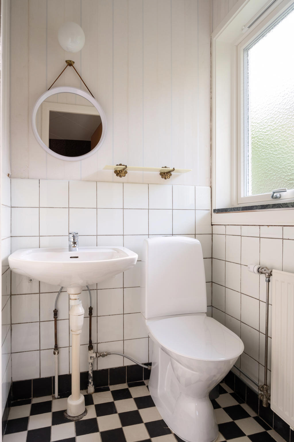 Toa på entréplan