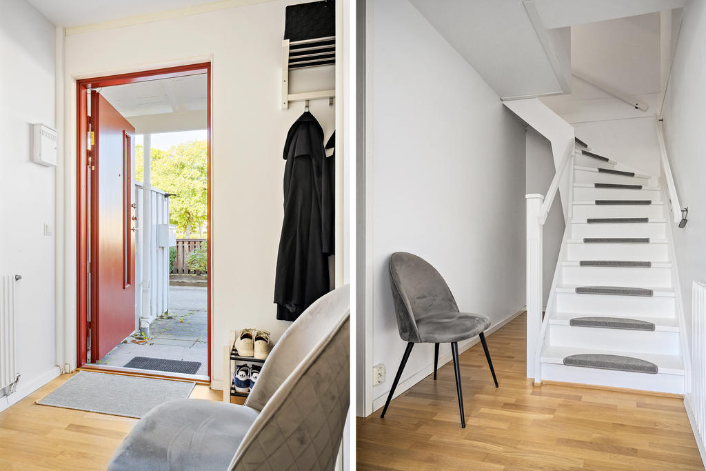 Välkomnande hall/entré med trappa upp till lägenheten
